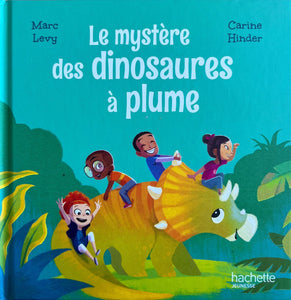 Le mystère des dinosaures à plume by Marc Levy